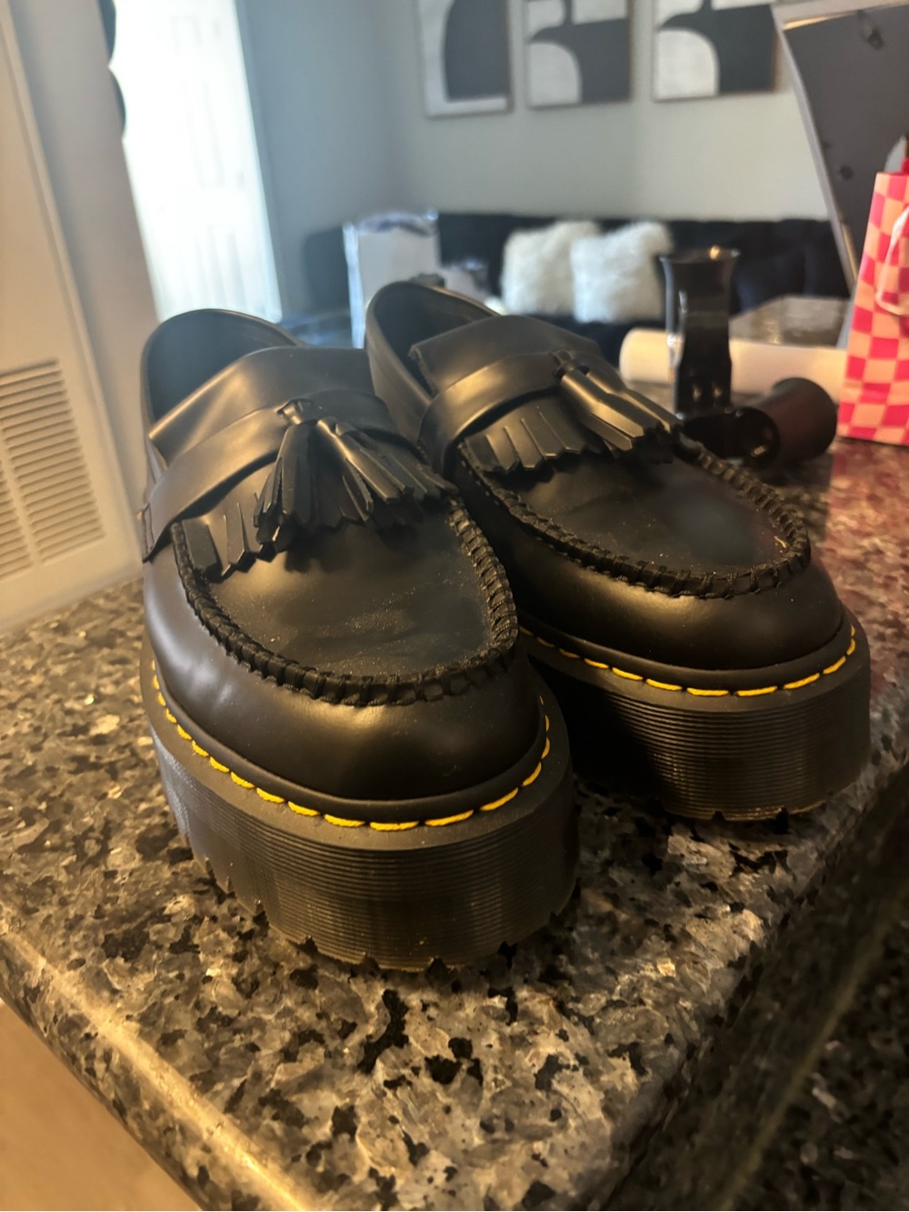 Dr. Martens Black Leather Tassel Platform Loafers with Yellow Stitching
